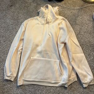 cream/yellow sweatshirt with halloween/fall decor on the back